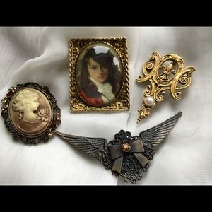 Four vintage brooches